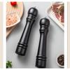 The black pepper grinder is refillable, with a wooden pepper mill and an adjustable stainless steel precision mechanism.