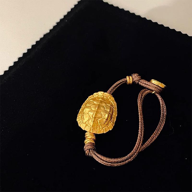 

Antique gold crafts brown braided rope Bracelet glossy turtle shell yellow god of wealth bracelets for women banquet jewelry