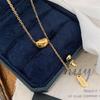 Minimalist Gold Bean Good Luck Necklace for Women - Fashionable Titanium Steel Tassel Chain