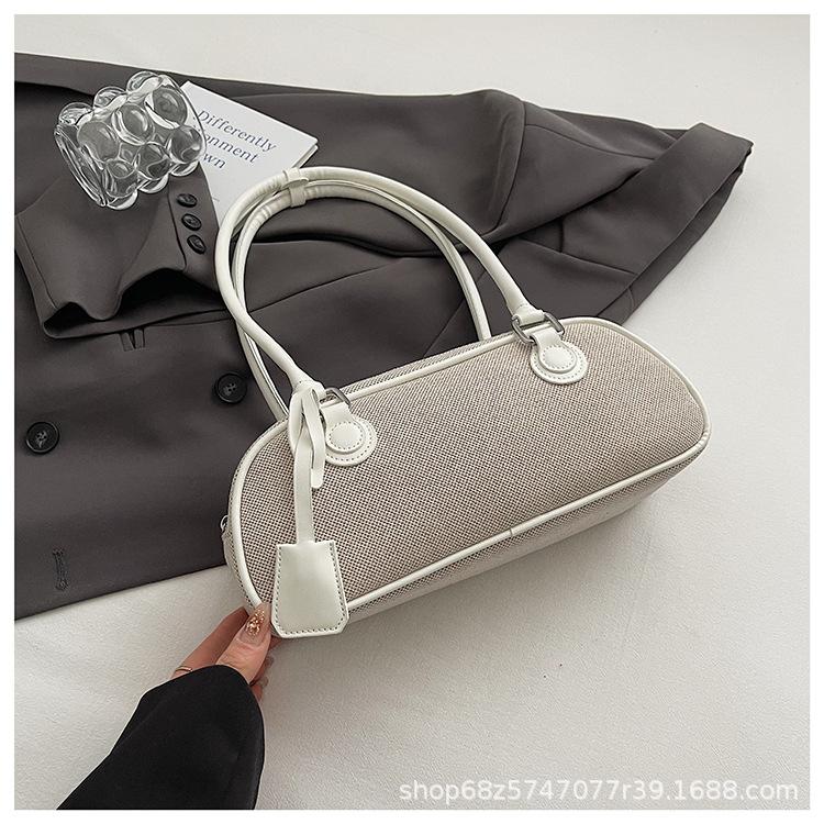 Bag Women s 2025 New Spring and Summer Niche Premium Portable Bowling Bag Retro One Shoulder Crossbody Baguette Bag