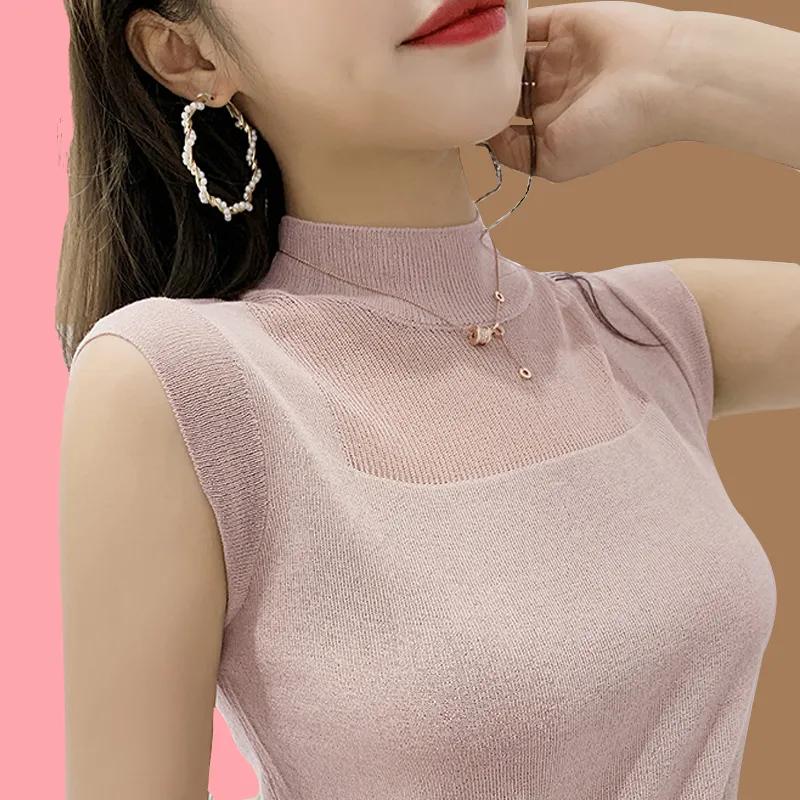 

Женский элегантный вязаный топ с полувысоким воротником, сетчатыми вставками, без рукавов, облегающего кроя S розовый