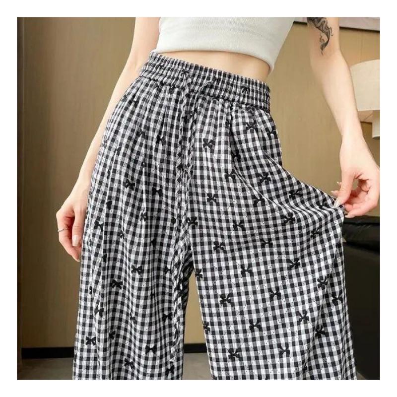 

Женские брюки с высокой талией, в ретро-клетку, с вышивкой в виде банта, широкие - Коллекция Лето 2025 S