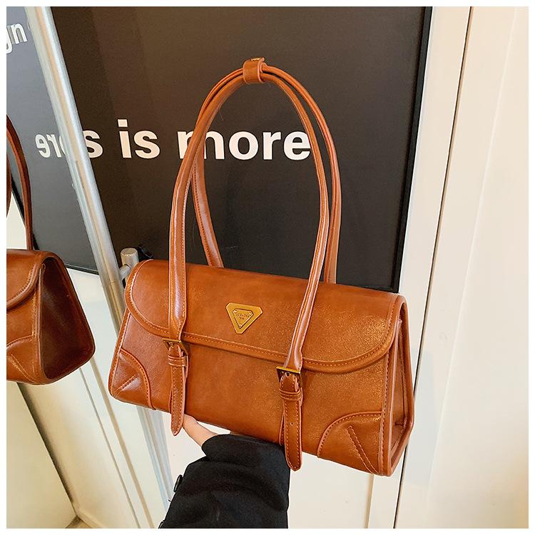 

Сумка женская 2024 осень новая мода популярная универсальная французская флип ретро сумка через плечо портативная сумка-багет