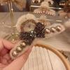 2025 New Year Red Plush Pearl Claw Clip - Stylish Women's Shark Hairpin Accessory for Buns and Hair Styling