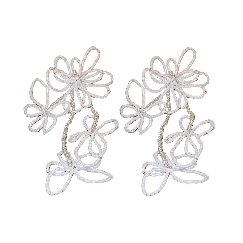 Silver Needle White Heart Tassel Earrings: Luxurious, Versatile, and Stylish Stud Earrings for Women.