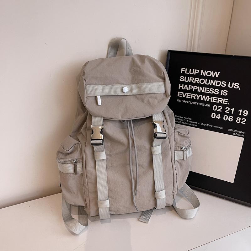 Niche design backpack female college students large-capacity travel backpack Japanese simple commuter high school students schoolbag tide