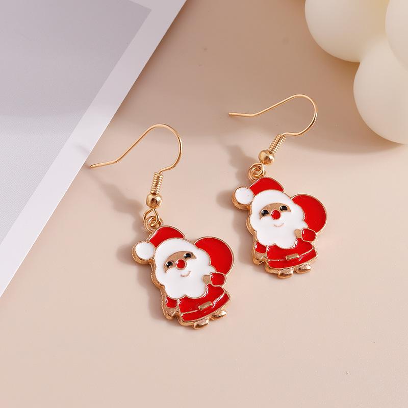 Weihnachtselch & Weihnachtsmann Schneeflocken-Ohrringe mit Persönlichkeit