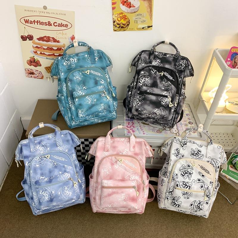 Harajuku printed portable clip student schoolbag Korean version large-capacity backpack