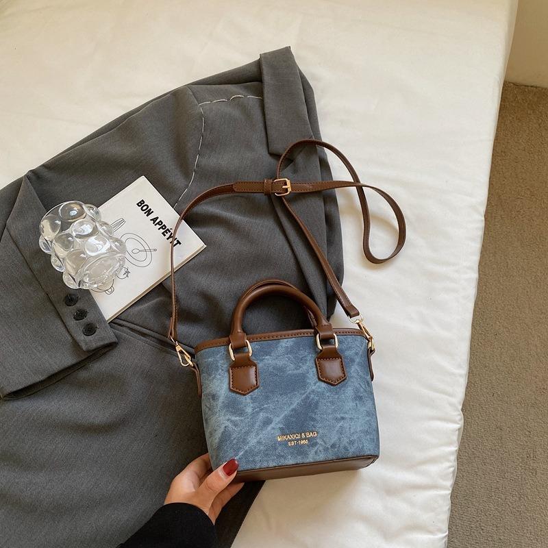 

Texture trendy niche bag autumn new retro shoulder messenger bag fashion portable bucket bag women