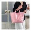 This Water-Resistant Pvc Tote Bag Features A Pink And Blue Striped Design, A Large Capacity, And Is Suitable For Beach Shopping,
