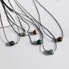 Unisex Retro Geometric Stone Pendant Necklace with Rotating Bead & Leather Cord – Versatile, High-End, Colorfast Design for Women & Men