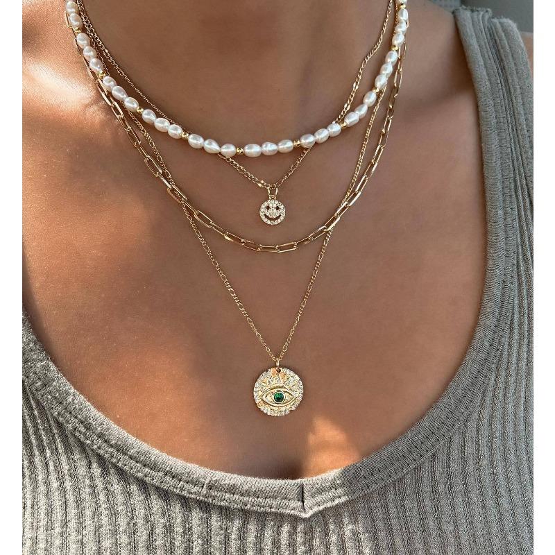 Temperament cold wind imitation pearl necklace retro light luxury diamond-encrusted smiley face devil's eye multi-layer necklace