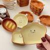 Cute bread-shaped ceramic sauce dish, cartoon smiley face condiment dish, creative kitchen dipping dish and snack dish tableware set.