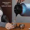 Huaxiang Smart Titanium Tea Pot with Temperature Display - Large Capacity, Insulated for Stewing and Brewing Tea.
