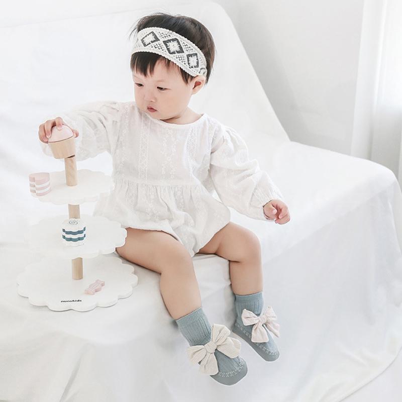 Anti-Rutsch Neugeborenen Baby Leder Sohle Bodensocken im koreanischen Stil mit großer Schleife zum Laufen für Kleinkinder Rutschfeste Fußbekleidung Socken