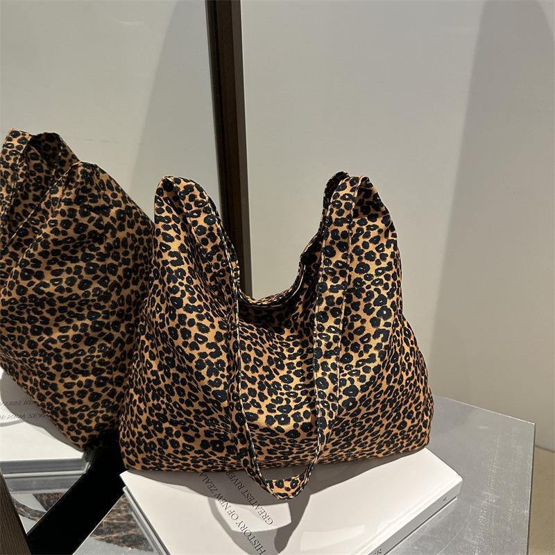 Design Sense Niche Canvas Bag Women's 2025 New Large-capacity Korean Leopard Print Floral Shoulder Student Printed Women's Bag
