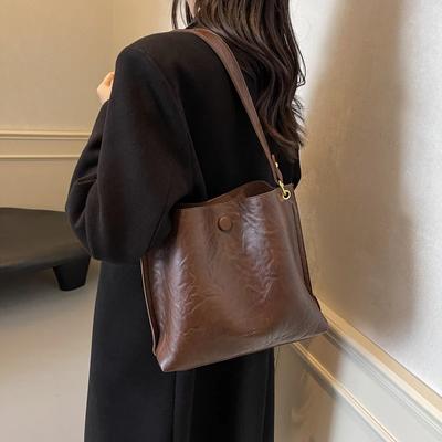 New Autumn and Winter Women's Bag  Niche Retro Design  Large Capacity  Bucket Single Shoulder Crossbody  Toiletry Bag