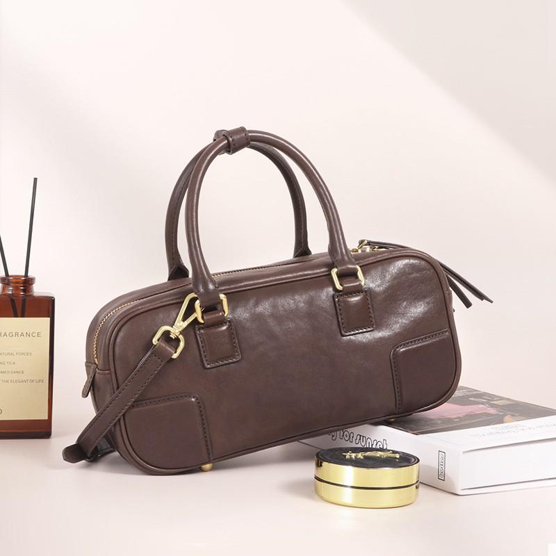 New Vegetable Tanned Leather Pillow Bag Women's Retro Niche Handbag Fashionable High-end Commuter Portable Boston