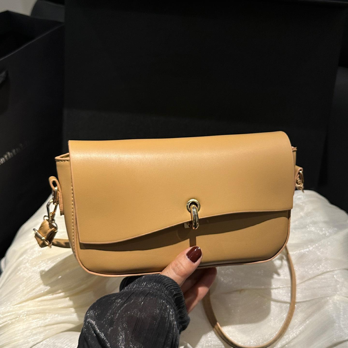 

Popular fashion women s bags women s 2025 four seasons new European and American small square bags retro oblique span shoulder bags PU women s small хаки