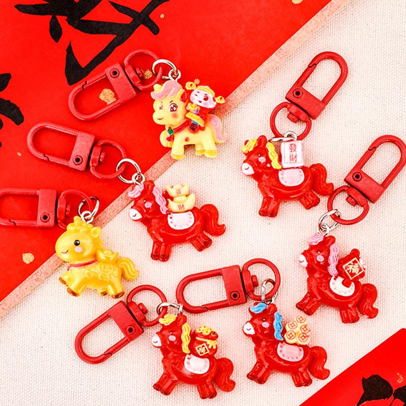 1/7 Stück Cartoon Jahr des Pferdes Schlüsselanhänger Niedlicher Harz-Pony-Schlüsselring Taschendekoration Zubehör Jahresanhänger Kleine Geschenke