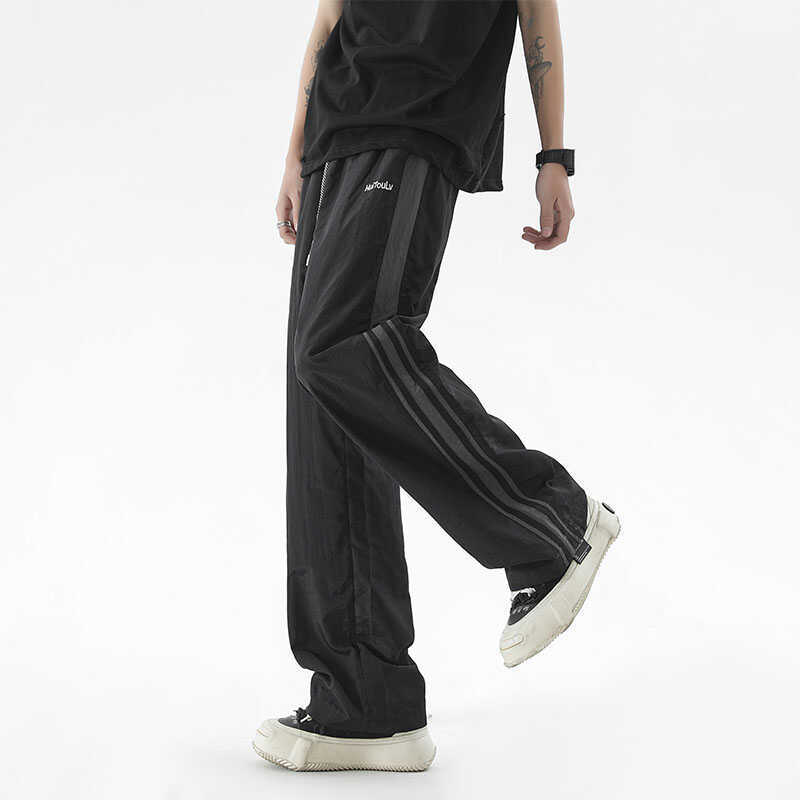 Męskie Wiosenne i Letnie Przystojne Luźne Sportowe Szybkoschnące Spodnie Robocze Casualowe Spodnie