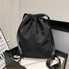 Schoolbag solid color Korean version drawstring retro versatile large capacity backpack female niche simple fashion personalized backpack