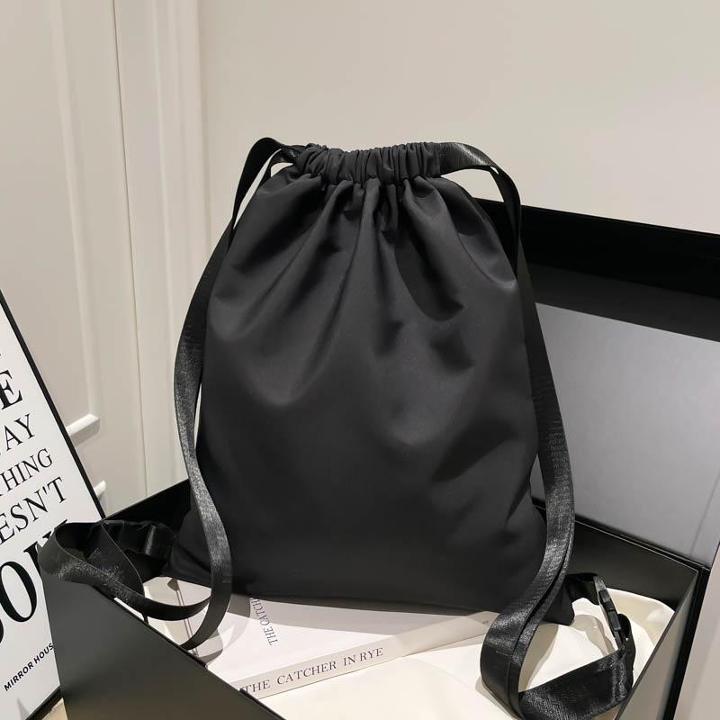 Schoolbag solid color Korean version drawstring retro versatile large capacity backpack female niche simple fashion personalized backpack