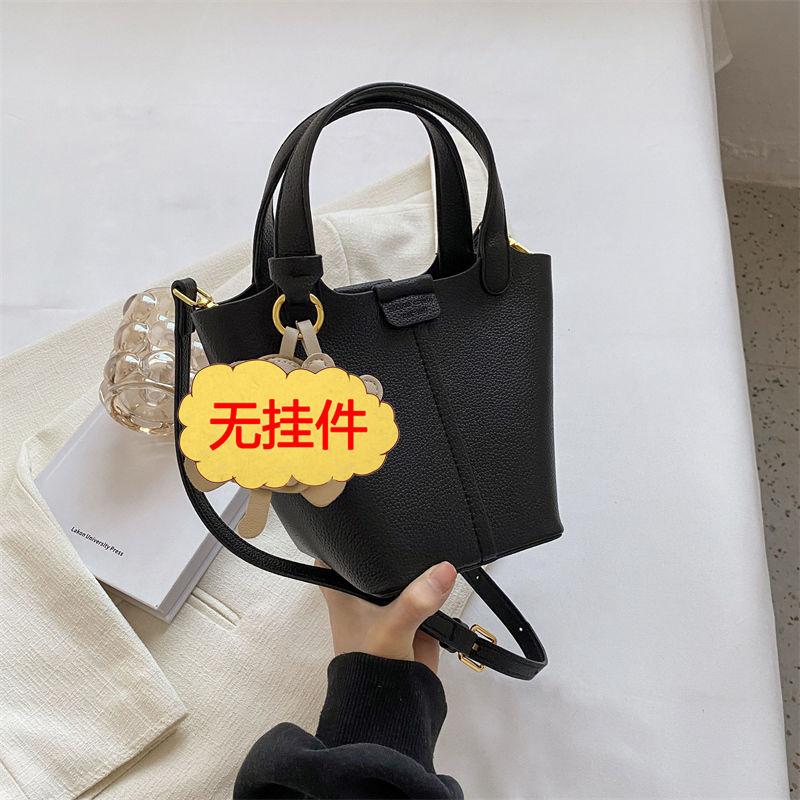 Premium sense bag women's 2025 spring new fashion work handbag solid color texture versatile messenger bucket bag