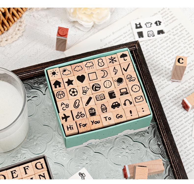 42-Piece Beech Wood Stamp Set: Numbers, Letters, Shapes & Emoticons.