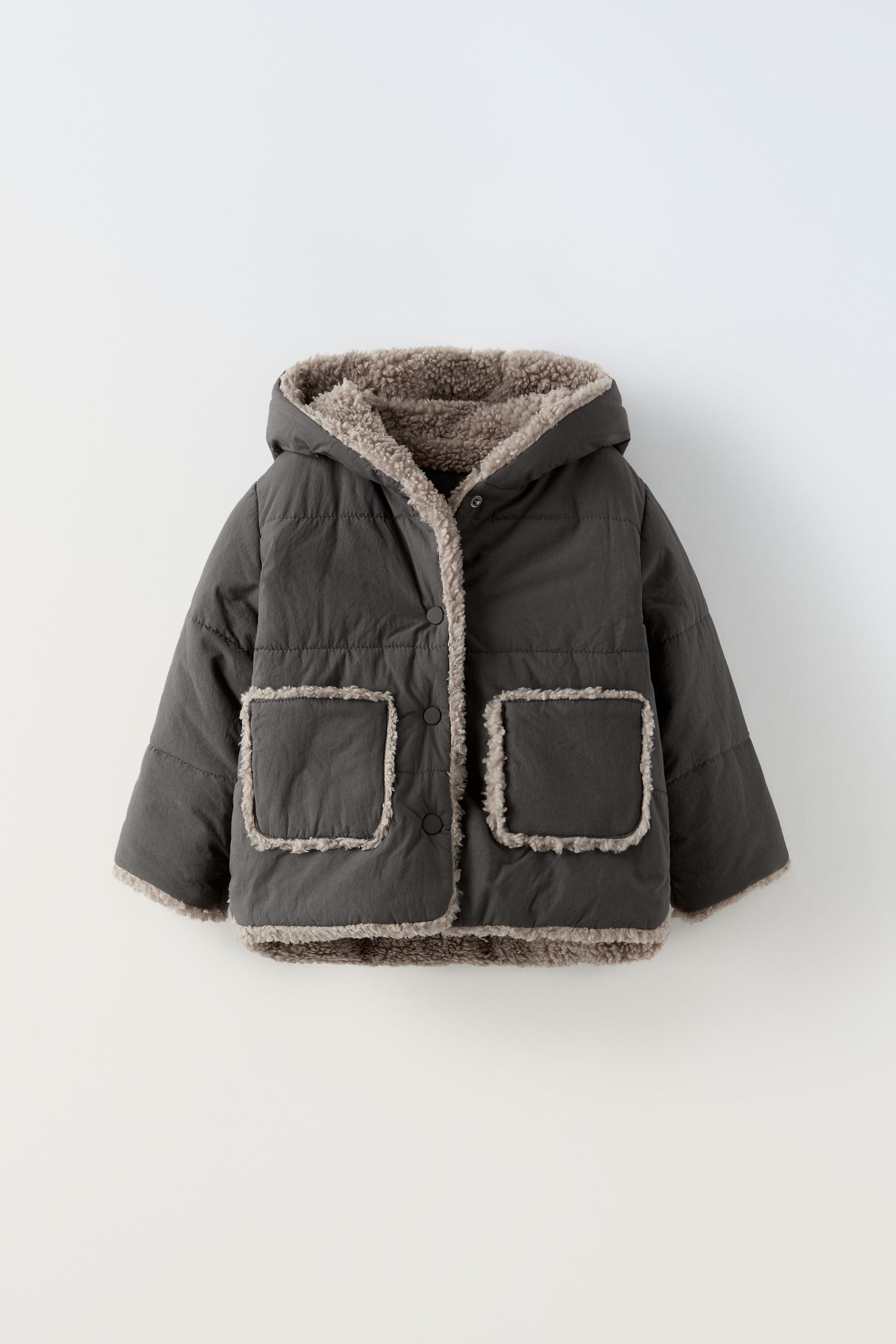 

КОНТРАСТНАЯ КУРТКА ИЗ ИСКУССТВЕННОЙ ДУБКИ