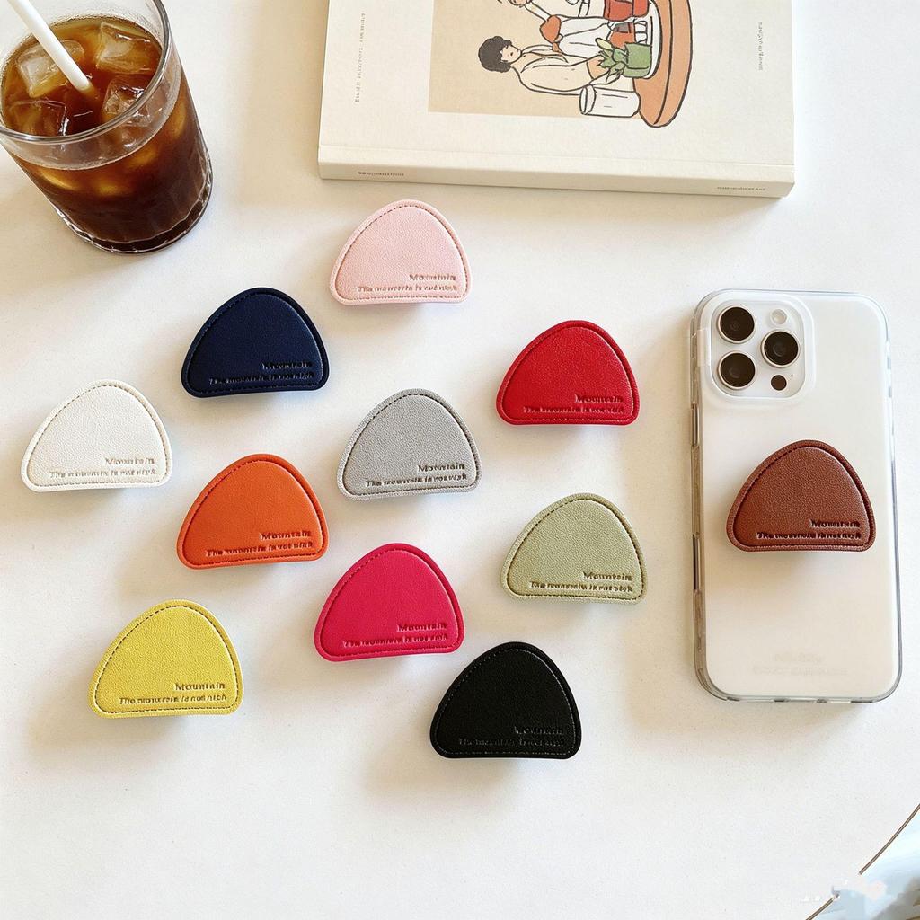 Irregular English Solid Color Leather Phone Holder & Airbag Stand for Desktop