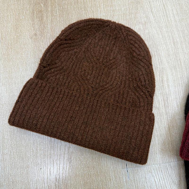 Fashion commuter style men's and women's knitted hats solid color warm eversion jacquard thickened wool hat outdoor hat