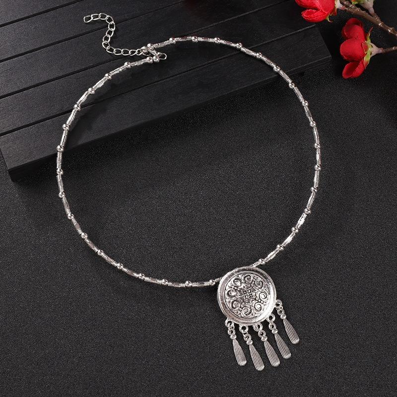 Vintage tassel collar hollow flower seedling silver pendant necklace niche personality collarbone chain women