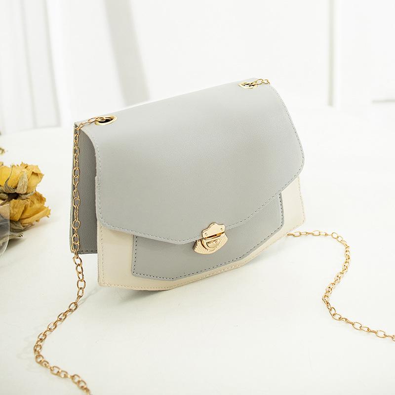

Fashion contrasting color splicing shoulder bag 2025 heart-shaped lock chain mobile phone shoulder messenger women s bag серый