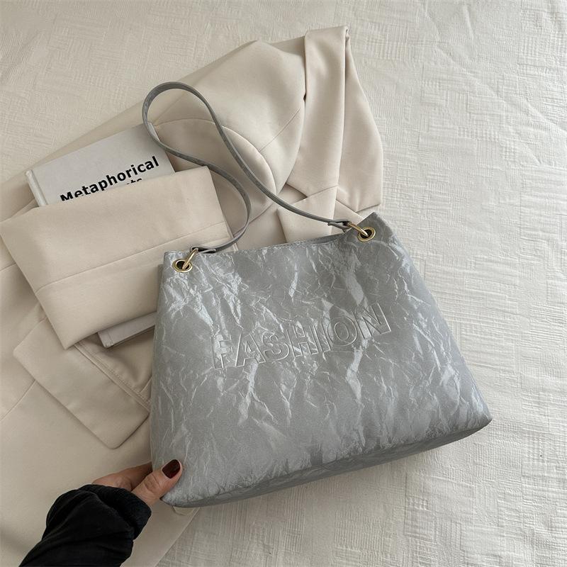 

Нова літня повсякденна сумка великої місткості 2024 р. Модна проста жіноча сумка через плече на ланцюжку Проста сумка-сумка срібний