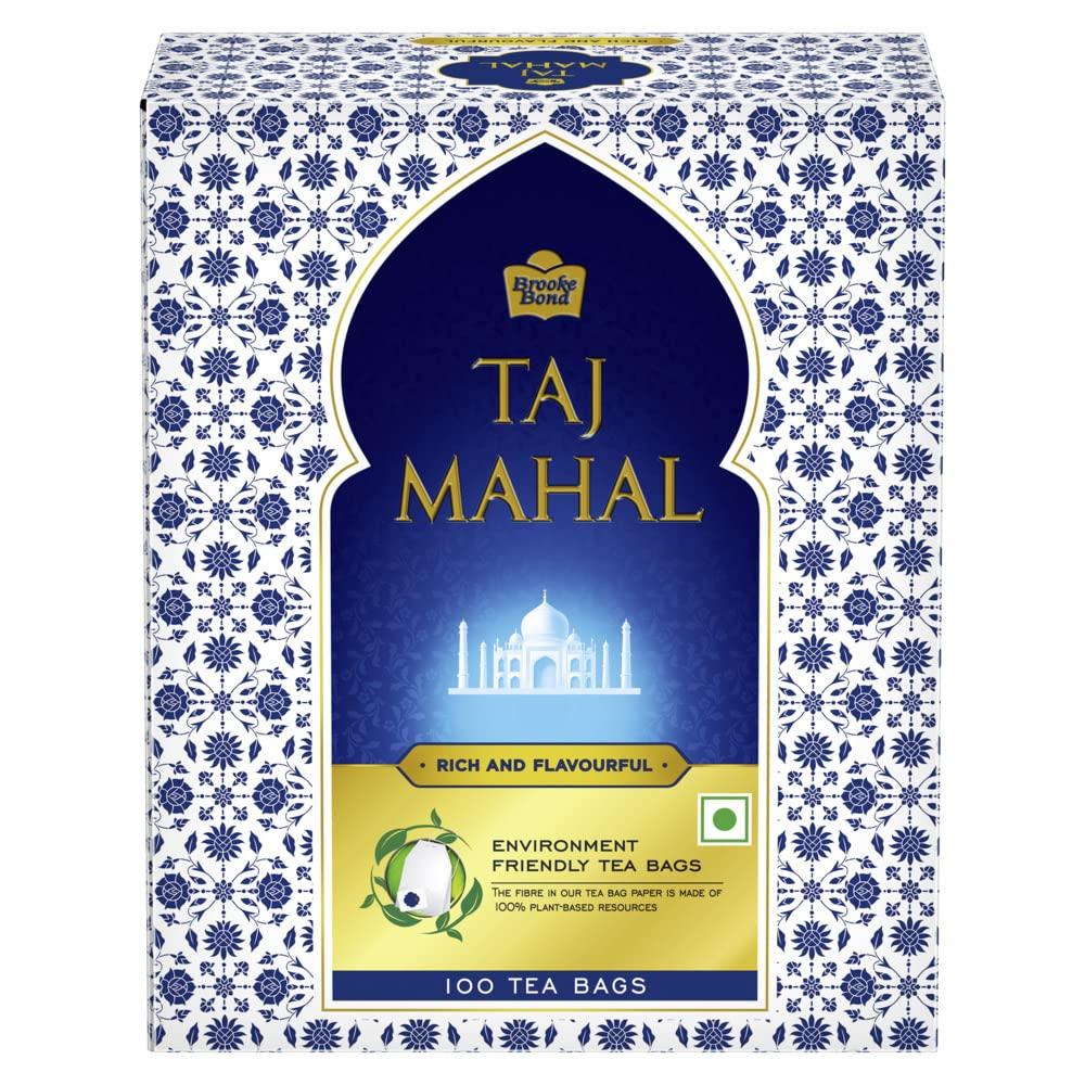 

Чайные пакетики Taj Mahal 100 шт. Премиальная смесь чая со вкусом апельсина. Насыщенный аромат, золотистый настой для освежающего вкуса и удобного повседневного чаепития.