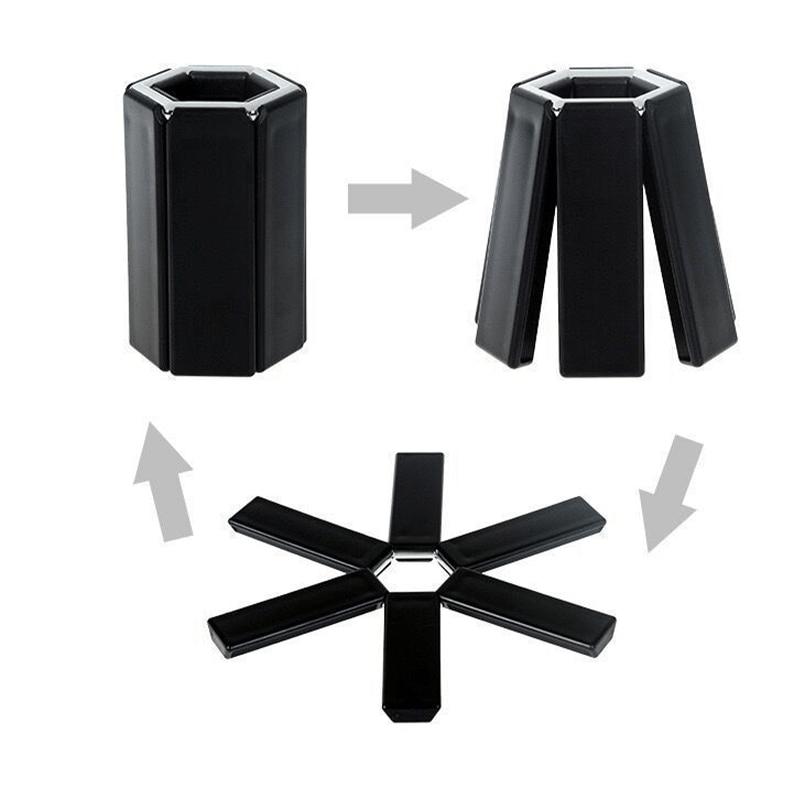 1 Stück Schwarze faltbare hitzebeständige und isolierende Matte, Geschirrtrockenmatte und Untersetzer, faltbar und waschbar, strapazierfähige und glatte Oberfläche.