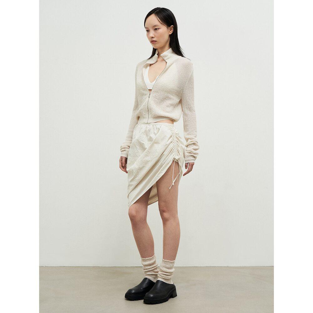 Anggae Wonderer Wrinkle String Mini Skirt Ivory