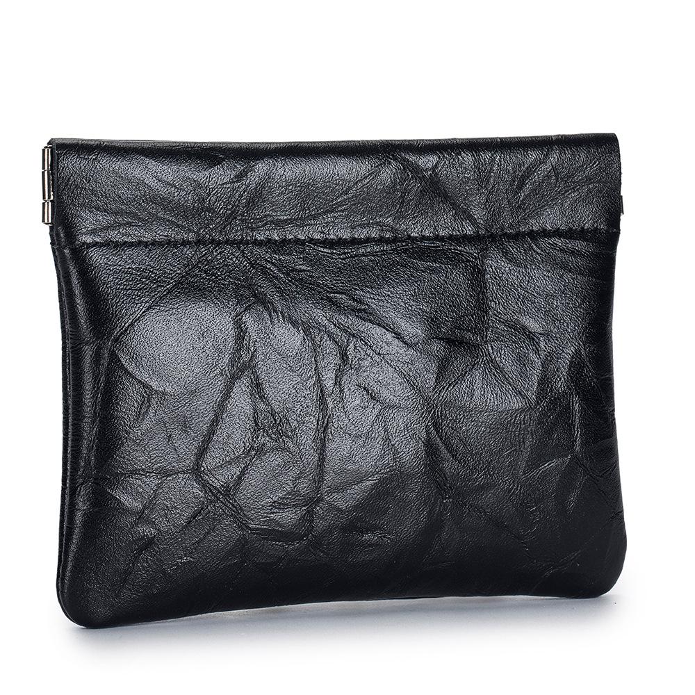 

Изысканная мини-сумка с пружинным зажимом для хранения наушников, помады и монет