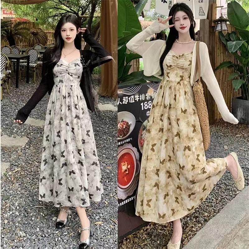 French gentle wind sleeveless dress women's summer design sense temperament waist printing A word suspender medium and long skirt