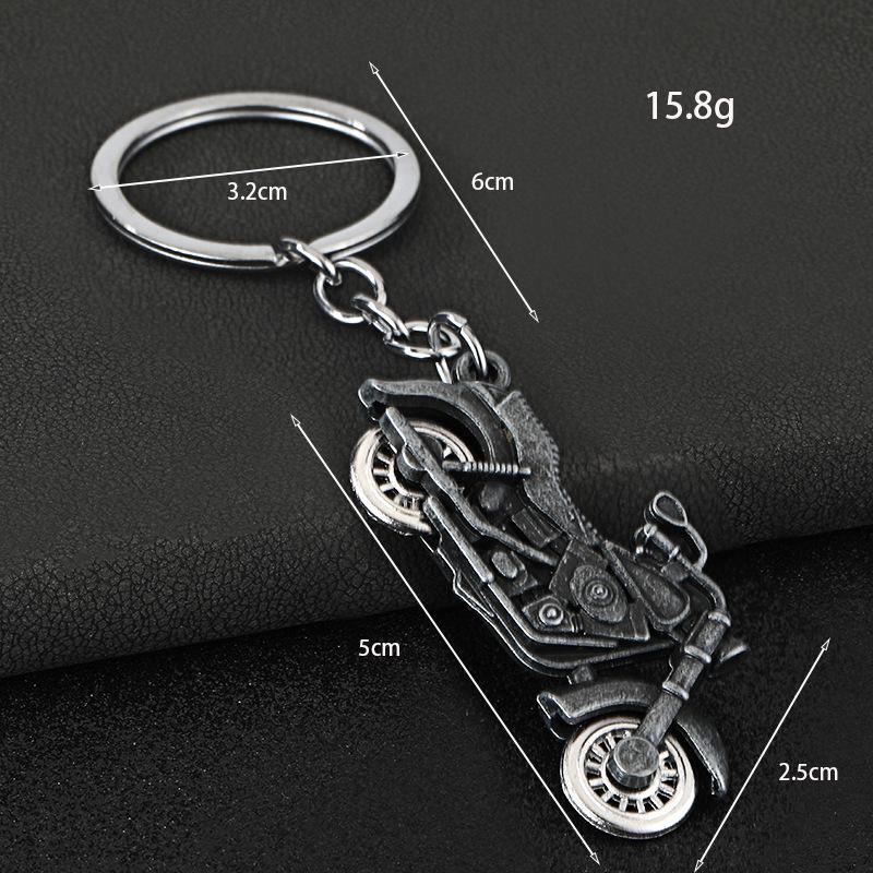Klíčenka s motocyklovým kolem: Simulovaná pohyblivá ozdoba