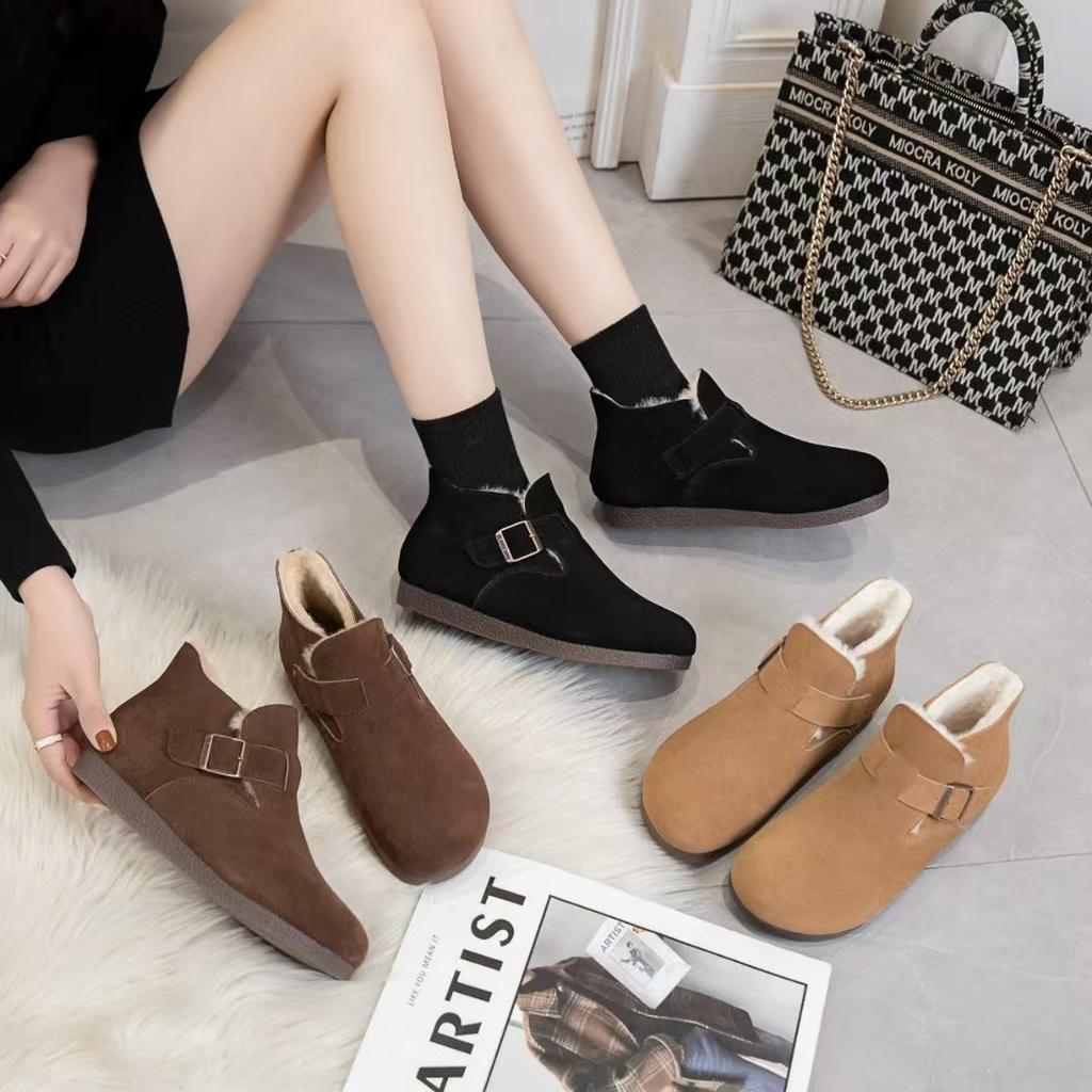 Leather snow boots women's cotton shoes autumn and winter new soft-soled piled thickened warm fluffy shoes flat short boots