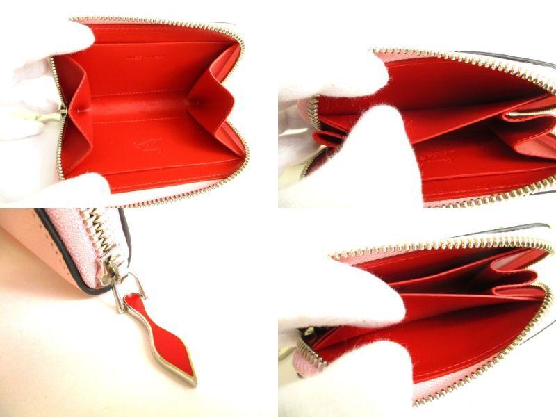 Porte-monnaie rond zippé en cuir rose clair Christian Louboutin authentique #9691 remis à neuf