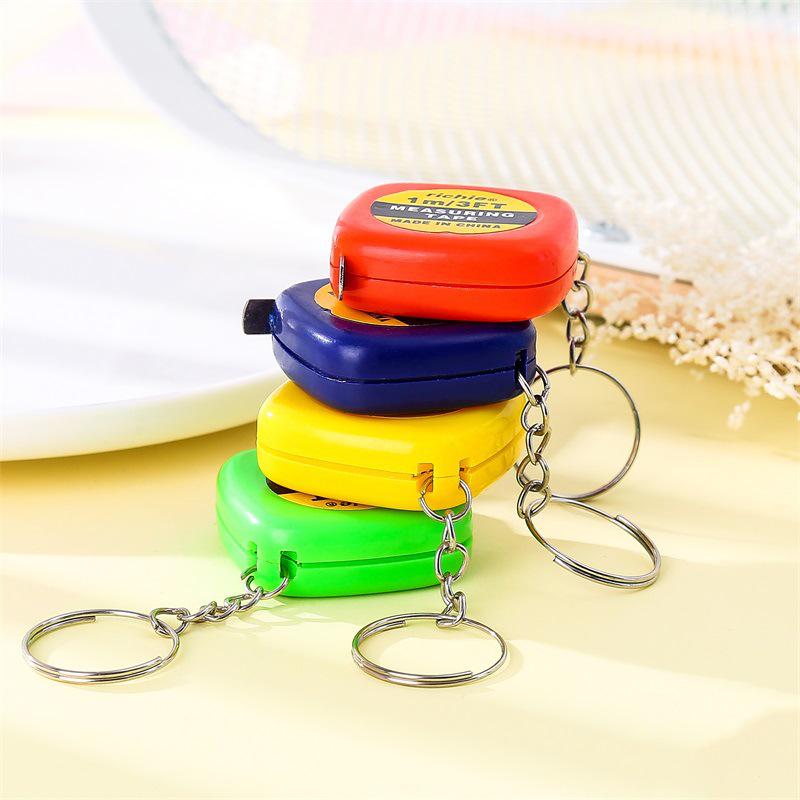 Retractable Mini Iron Ruler Keychain Pendant with Measuring Tape - Multipurpose Steel Ruler for Easy Measurements On the Go.