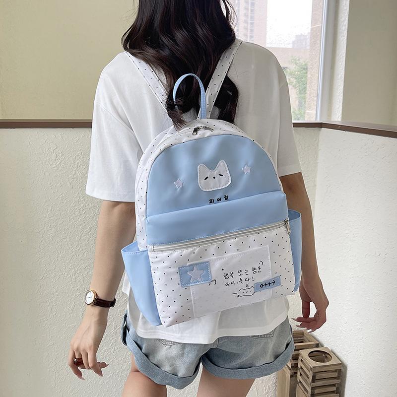 Schoolbag niche non-collision polka dot black cat schoolbag female Korean girl large capacity portable backpack student leisure bag
