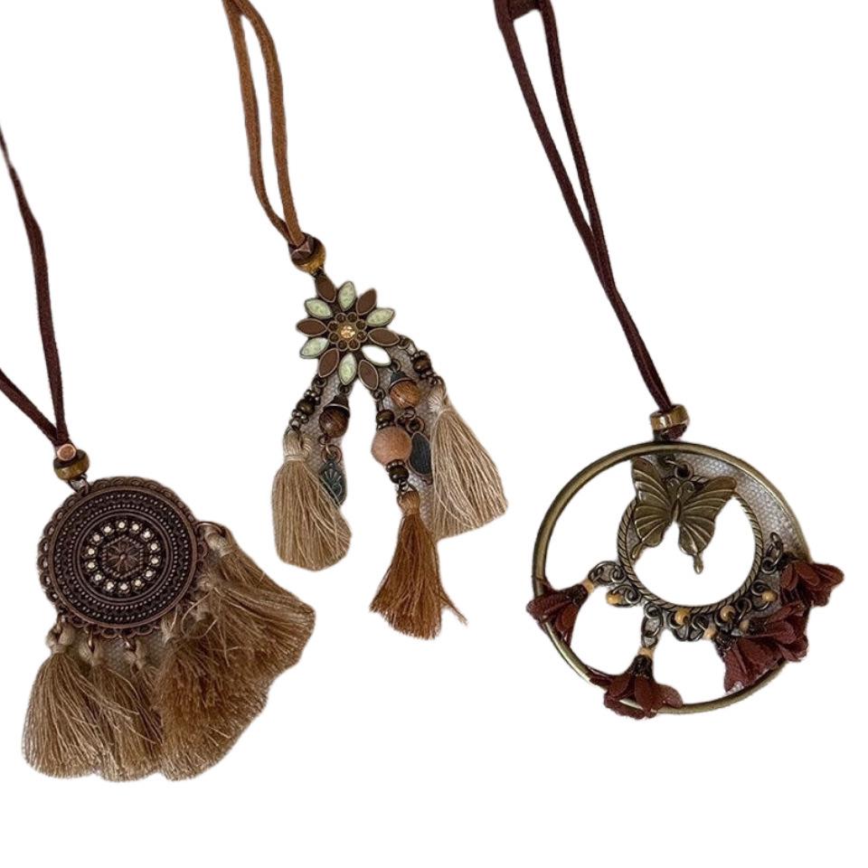 Bohemian Ethnic Distressed Bow Metal Necklace with Versatile Long Round Pendant 2025