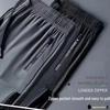 Men's Summer Ice Silk Quick-Dry Casual Trousers: Breathable, Loose-Fit, Large Size, Ideal for Sports and Air-Conditioned Environments.