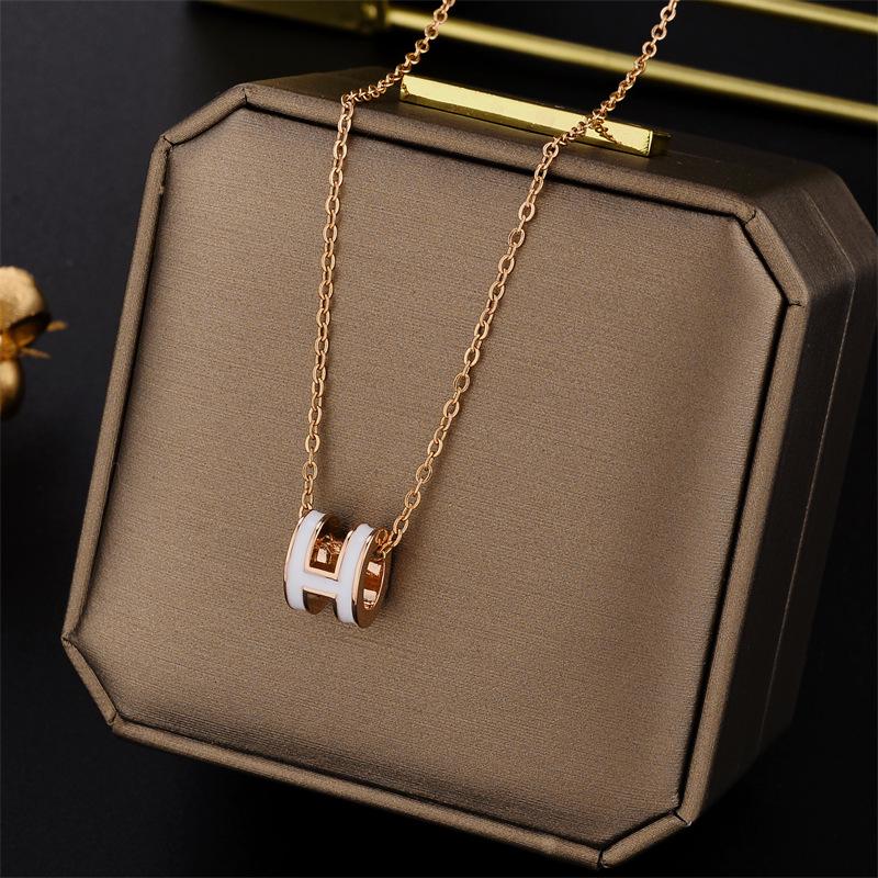 Elegant Colorfast 18K Rose Gold Necklace with Swan & Four-Leaf Clover Charm