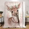 A delicate fawn adorned with a floral crown and pink ribbon on its neck. for all seasons blanket lunch break throw gift