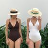 The source is a triangular one-piece swimsuit for women with small breasts soaking in hot spring 1011 new swimsuit.